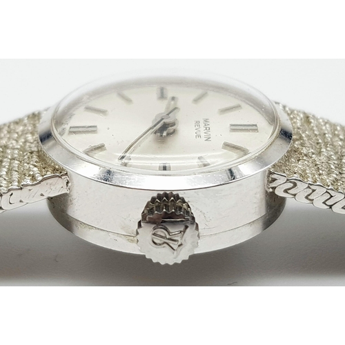 42 - 9K WHITE GOLD MARVIN MANUAL WIND LADIES COCKTAIL WATCH, 18CM LENGHT AND 16MM CASE APPROX
COME IN ORI... 