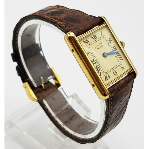 61 - A gents Must de Cartier, silver, gold plated watch with Crocodile leather strap. Quartz, Swiss movem... 