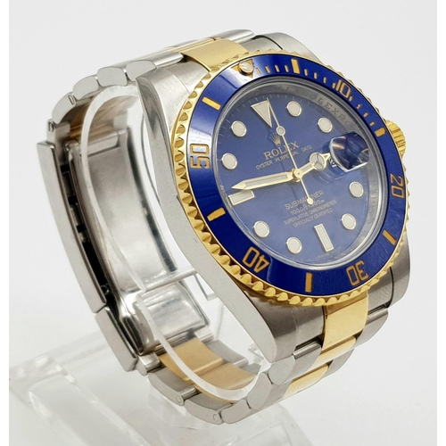 8 - A gents ROLEX Oyster Perpetual Date, Submariner, stainless steel and 18 K yellow gold watch. 40 mm d... 