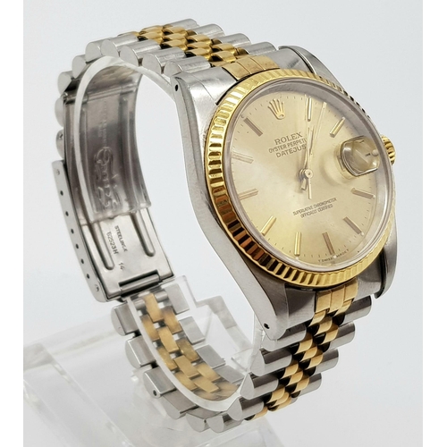 100 - A gents ROLEX Oyster Perpetual Datejust stainless steel and 18 K yellow gold watch. 36 mm dial, with... 