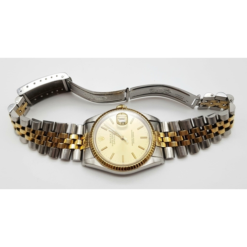 100 - A gents ROLEX Oyster Perpetual Datejust stainless steel and 18 K yellow gold watch. 36 mm dial, with... 