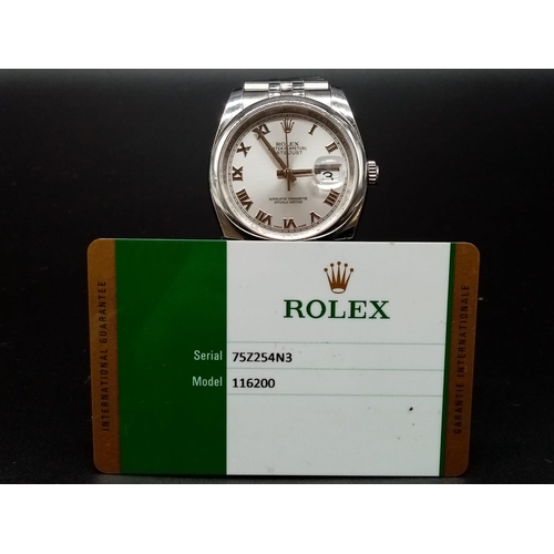 107 - A gents ROLEX Oyster Perpetual Datejust, stainless steel watch. 36 mm dial with white metal face, ha... 