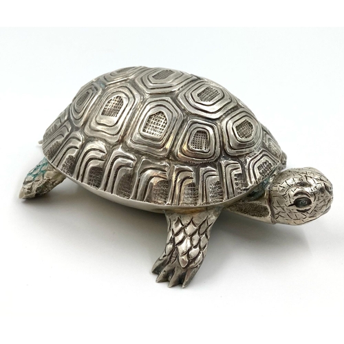 19 - A stunning large solid silver European tortoise table lighter 
Marked 800 possibly Italian
Top condi... 