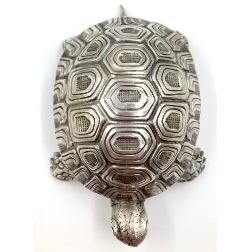 19 - A stunning large solid silver European tortoise table lighter 
Marked 800 possibly Italian
Top condi... 