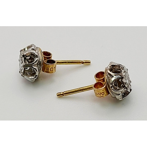 232 - A PAIR OF 9K GOLD DIAMOND STUD EARRINGS.  2.4gms