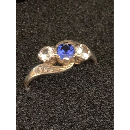 361 - 9 carat GOLD and SAPPHIRE RING , having centre Sapphire with clear tourmaline to  either side.
 2.5 ... 