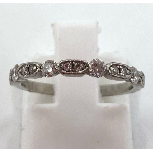 459 - A PLATINUM HALF ETERNITY RING WITH .25CT DIAMONDS.  2.15gms   size H/I