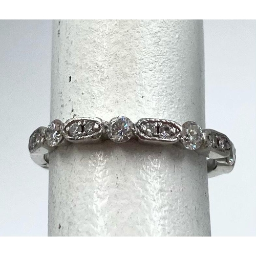 459 - A PLATINUM HALF ETERNITY RING WITH .25CT DIAMONDS.  2.15gms   size H/I