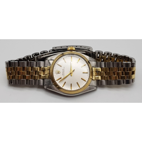 68 - A unisex ROLEX Oyster Perpetual stainless steel and 18 K yellow gold watch. 31 mm dial, white face w... 