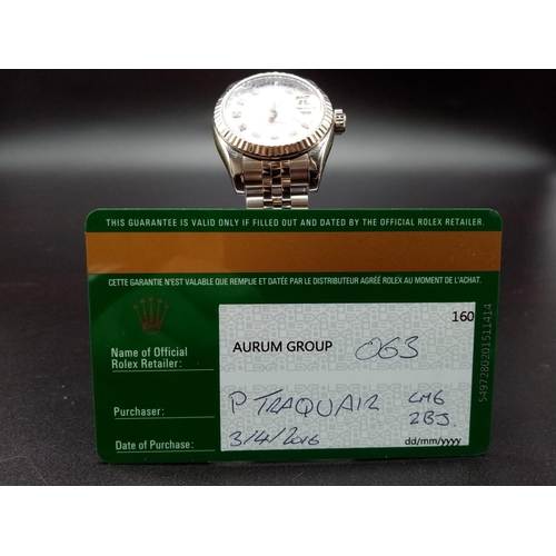 82 - A ladies ROLEX Oyster Perpetual Datejust, stainless steel watch. 26 mm dial, pink face with diamond ... 