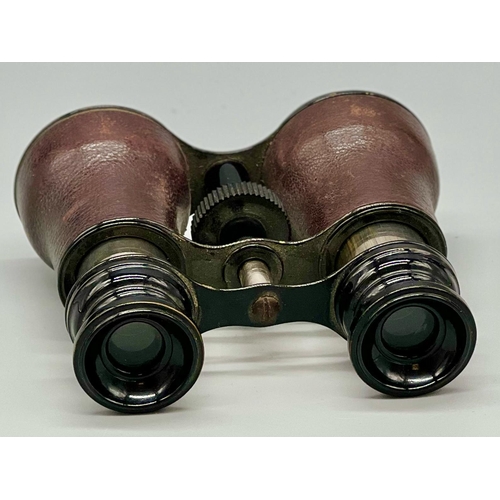 391 - A PAIR OF LEATHER BOUND STATIC OPERA GLASSES WITH FOCUS ADJUSTMENT ,A/F