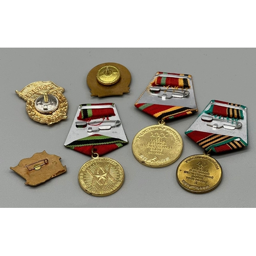 427 - A collection of Russian Medals and Badges including Advanced Guard (Red Guard) Badge