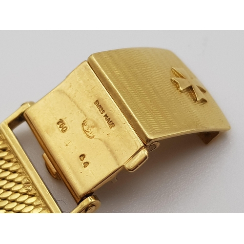 54 - A gents, Vacheron & Constantin, 18 K yellow gold watch. Slim body, with 32 mm dial, white metal face... 