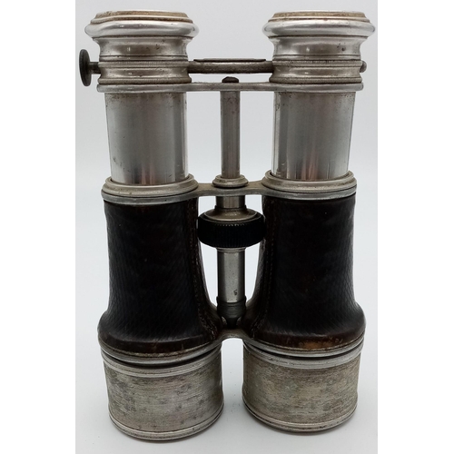 585 - AN UNUSUAL PAIR OF TRIPLE SWITCHABLE LENS,   A/F BINOCULARS WITH SETTINGS FOR FIELD ,THEATRE AND MAR... 