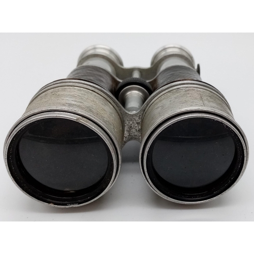 585 - AN UNUSUAL PAIR OF TRIPLE SWITCHABLE LENS,   A/F BINOCULARS WITH SETTINGS FOR FIELD ,THEATRE AND MAR... 