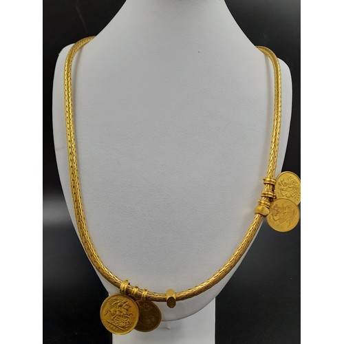 37 - A glorious 18 K yellow gold necklace, with four sovereign pendants and two double sovereign pendants... 