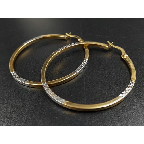 55 - A Mixed Jewellery Lot of 14K and 9K Gold. To include: 
14K - A pair of hoop earrings, a link necklac... 