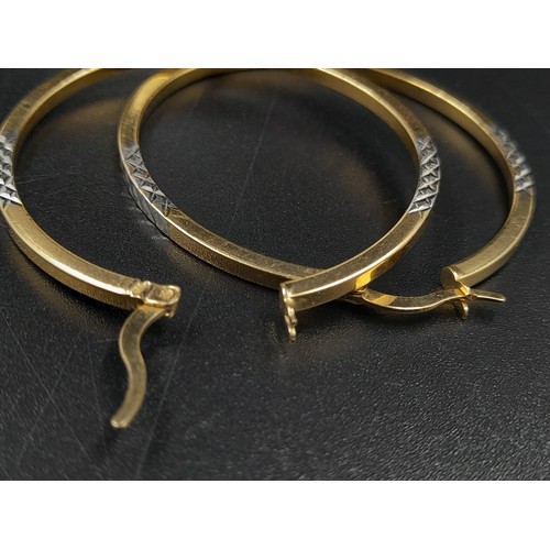 55 - A Mixed Jewellery Lot of 14K and 9K Gold. To include: 
14K - A pair of hoop earrings, a link necklac... 