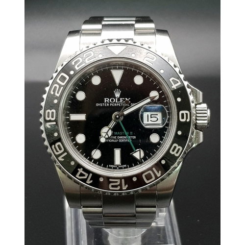 15 - A gents, ROLEX Oyster perpetual, Date, GMT Master II, watch, in very good condition and working orde... 