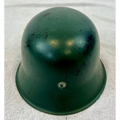 195 - Original German M42 Helmet with Replacement Decals
and Liner.