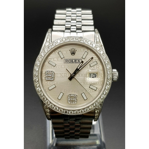 29 - A gents ROLEX Datejust stainless steel watch. 36 mm dial with diamond bezel and champagne coloured f... 