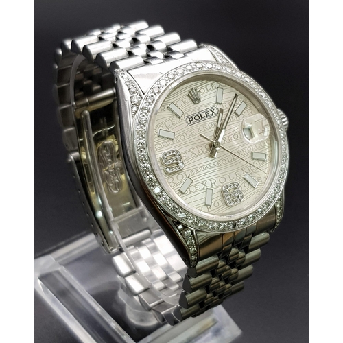 29 - A gents ROLEX Datejust stainless steel watch. 36 mm dial with diamond bezel and champagne coloured f... 