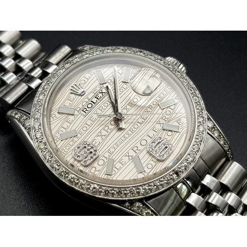 29 - A gents ROLEX Datejust stainless steel watch. 36 mm dial with diamond bezel and champagne coloured f... 