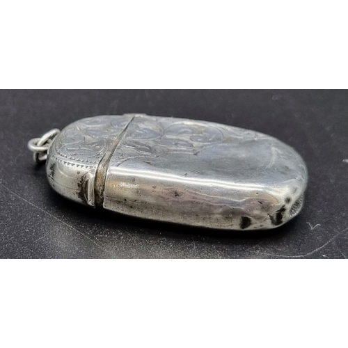 295 - An Antique Silver Vesta Case. Hallmarks for Birmingham 1906. Hinge works well. 3 x 4.5cm