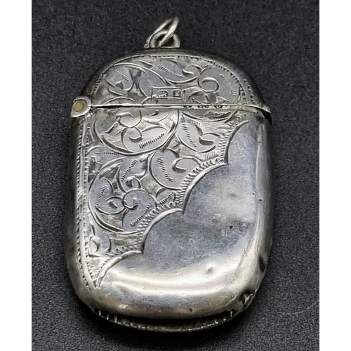 295 - An Antique Silver Vesta Case. Hallmarks for Birmingham 1906. Hinge works well. 3 x 4.5cm