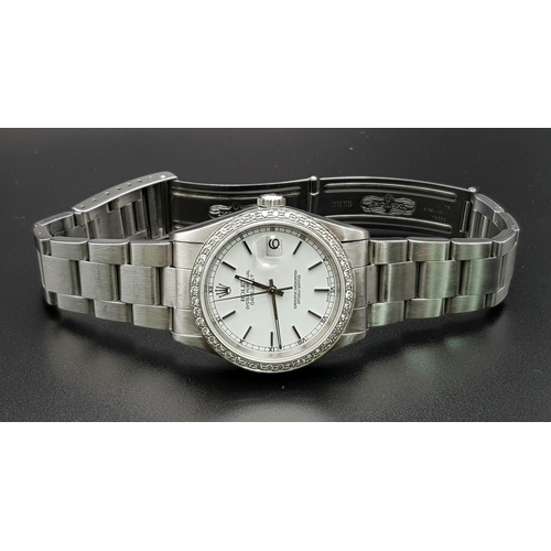 75 - A gents, ROLEX Oyster Perpetual Datejust, watch. Stainless steel, 36 mm dial with diamond studded be... 