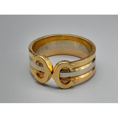 297 - A Cartier 18K Gold Trio-Coloured Double-C Ring. Size G. 4.2g. In very good condition.