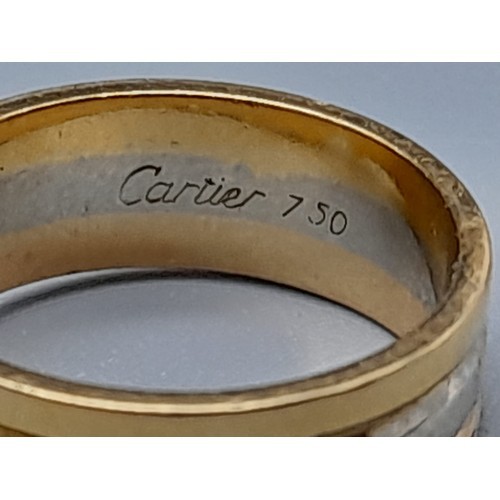 297 - A Cartier 18K Gold Trio-Coloured Double-C Ring. Size G. 4.2g. In very good condition.