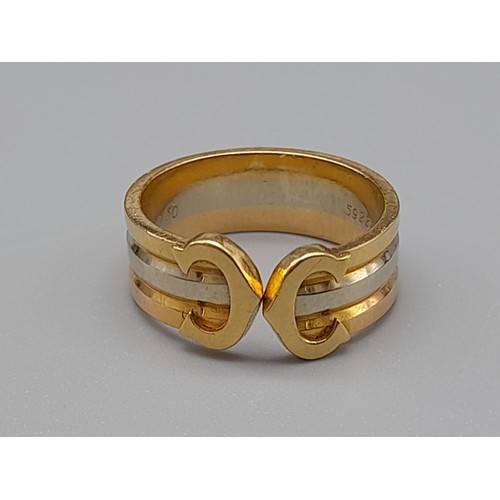 297 - A Cartier 18K Gold Trio-Coloured Double-C Ring. Size G. 4.2g. In very good condition.