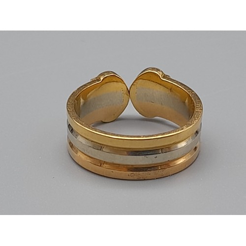 297 - A Cartier 18K Gold Trio-Coloured Double-C Ring. Size G. 4.2g. In very good condition.