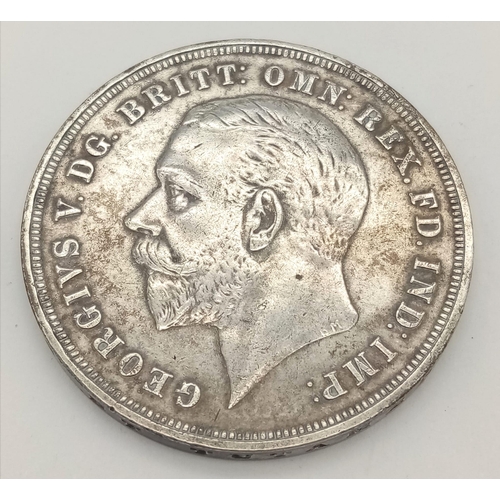 386 - Two 1935 George V Rocking Horse Silver Crown Coins. 
56.55g total weight. Very fine condition but pl... 