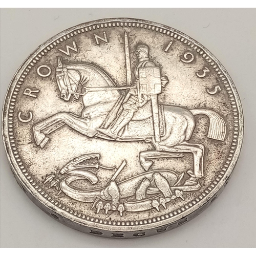 386 - Two 1935 George V Rocking Horse Silver Crown Coins. 
56.55g total weight. Very fine condition but pl... 