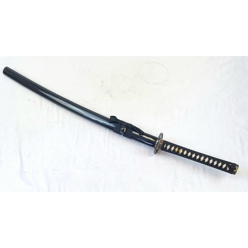 387 - A Reproduction Hand-Forged Tetsuyama Katana. Comes with a scabbard. Blade length - 74cm.