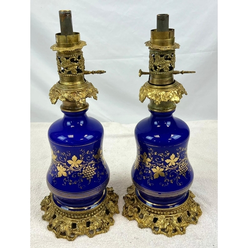 293 - A Pair of Antique Cobalt Blue Ceramic and Ornate Gilded Lamps. 48cm tall. Good condition but A/F.