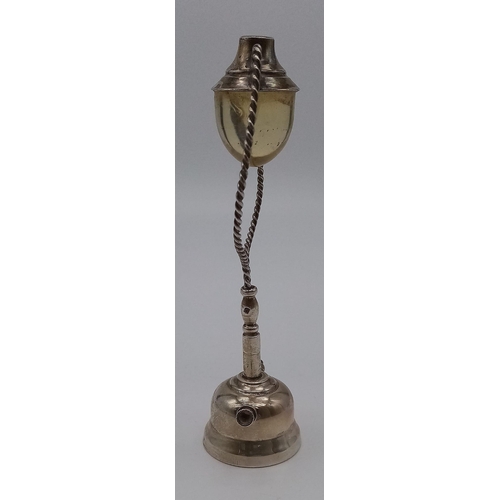 493 - A Vintage Egyptian Silver Lamp Ornament. Hallmarks for Cairo - 900 silver purity. 14cm tall. 58g