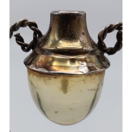 493 - A Vintage Egyptian Silver Lamp Ornament. Hallmarks for Cairo - 900 silver purity. 14cm tall. 58g