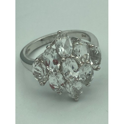 222 - SILVER and WHITE TOPAZ cluster ring with marking inside band for the Genuine Gemstone Company and 92... 