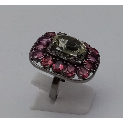 318 - 3.80cts Citrine centre stone set Ring with 5.50cts Rhodochrosite and 0.35cts Diamonds decorating in ... 