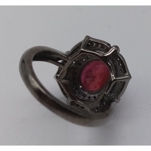 426 - 5.80cts Ruby Centre stone set Ring with 0.60cts Diamonds surrounding, Antique Style size N