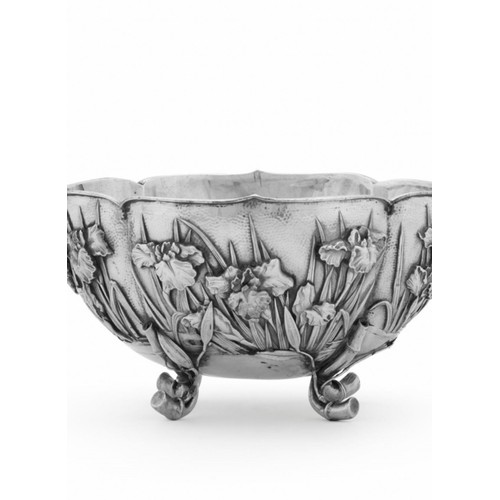 514 - A large stunning solid silver Japanese bowl
C1900,

Lobed oval form, chased and embossed with water ... 