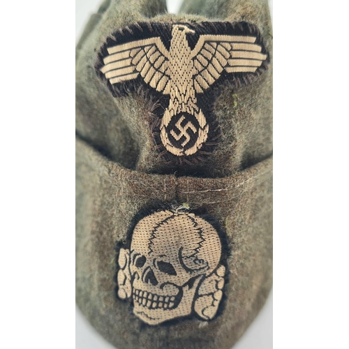 18 - Waffen SS Enlisted Mans/Nco’s Overseas M40 Cap. The insignia passes the black light test and has bee... 