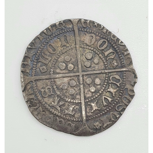 556 - A 1422-61 Henry VI Hammered Silver Groat Coin. 
3.65g. 25mm. Please see photos for conditions. A/F.