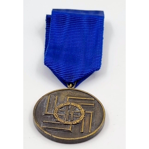 302 - Museum Quality Replica Waffen SS Long Service Medal. A very good convincing copy that worn look good... 