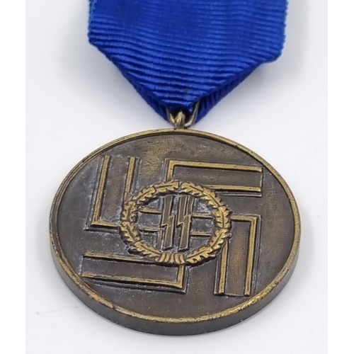 302 - Museum Quality Replica Waffen SS Long Service Medal. A very good convincing copy that worn look good... 