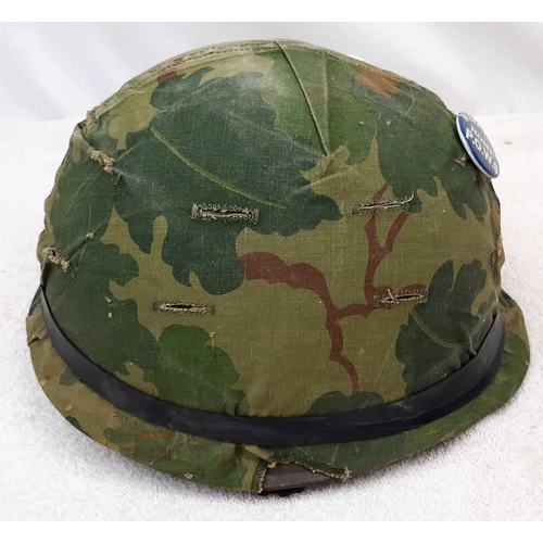 316 - Vietnam War Era US M1 Helmet and liner. Complete with a reversible Mitchel/Duck Hunter cover.