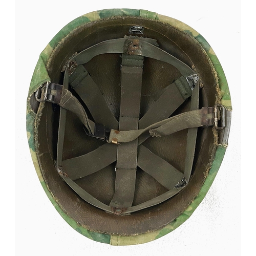 316 - Vietnam War Era US M1 Helmet and liner. Complete with a reversible Mitchel/Duck Hunter cover.